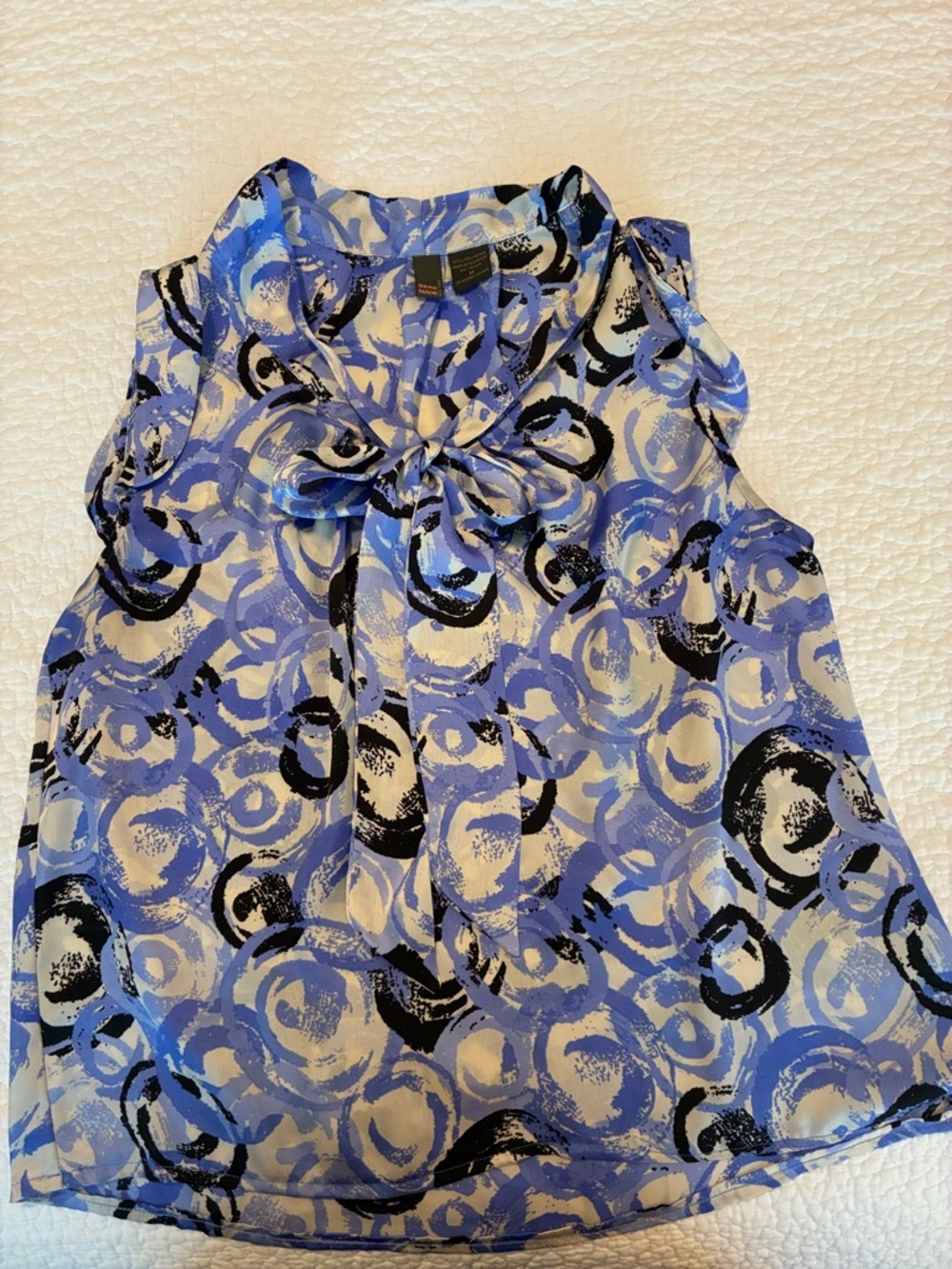 Sleeveless Blue Print Tie-Neck Blouse